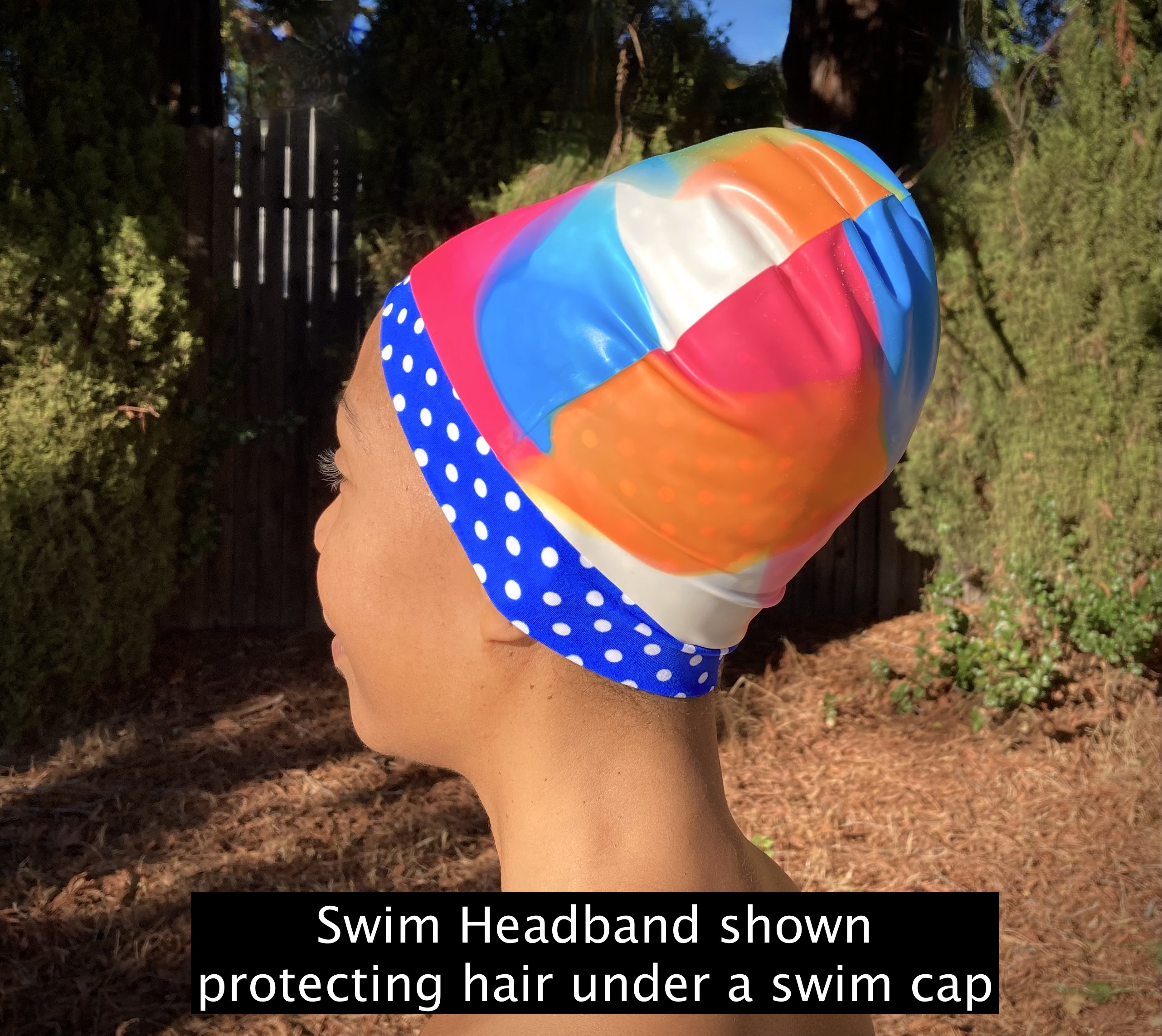 Swim headband shown protecting hair under a swim cap